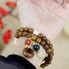 Pulsera redonda de sándalo de seda dorada DIY especificaciones 0.8 viento simple para hombres y mujeres adornos de rosario fabricantes de joyería venta al por mayor