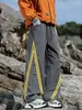 Calça Casual Esportiva Outdoor Masculina Nova Outono 2026 de Perna Larga Solta com Listras Coloridas da Série Montanha Teyun