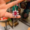 2023 deseo transfronterizo nuevo moda europea y americana simulación corindón rojo pétalo colgante collar anillo conjunto para mujer