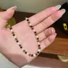 Collar de Cuentas Exquisito Retro Ojo de Tigre Maillard Mariposa Cadena para Clavícula Elegante de Lujo Ligero Nicho Versátil
