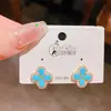 Pendientes de Flor de Cuatro Hojas de Zirconia Turquesa Imitación Retro de Aguja Plateada de Lujo Ligero de Gama Alta Pendientes Clásicos Retro Estilo Chino Nuevo