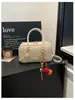 2026 Nueva Bolsa de Bolos con Textura Tejida para Mujer Lujo Ligero Estilo Old Money Bolso de Hombro Único Cruzado Bolso Boston Almohada