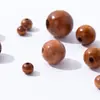 Acessórios de joalheria contas de pinho contas Hemu contas redondas log oleado almofada de carro contas de madeira vendas diretas da fábrica