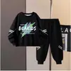 Conjunto de Dos Piezas de Sudadera Estilo Primavera y Otoño para Niños 2026 Niños y Niñas Sudadera con Estampado de Letras y Pantalones Jogger Conjunto de Dos Piezas Moderno