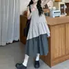 Moda Femenina Verano 2026 Versátil Retro Japonés Holgado Cuello en V Sin Mangas Rayas Camiseta sin Mangas Moderna