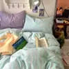 Juego de ropa de cama suave y amigable con la piel a rayas de cuatro piezas conjunto de tres piezas para estudiante de dormitorio estilo americano simple sábana al por mayor sensación fresca