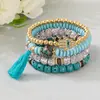 Bestseller transfronterizo estilo bohemio ojo turco borla colgante pulsera multicapa cordón elástico pulsera de cuentas