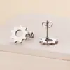 Pendientes de acero de titanio 316L joyería de moda forma de engranaje tres colores opcionales fábrica en stock suministro transfronterizo de Amazon
