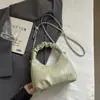 Bolsa de Mão Plissada Nuvem Estilo Coreano 2026 Nova Bolsa de Ombro Versátil com Corrente Transfronteiriça Super Popular Bolsa Transversal de Alto Padrão