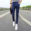 Una generación de jeans para hombre versión coreana de leggings elásticos ajustados otoño nuevo negro pantalones para hombre marea