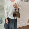 Bolso de hombro nuevo, elegante y versátil 2026, un bolso de mano mate de alta gama, de nicho, bolso de axila y bolso cruzado