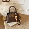 Bolsa Pequena Retrô Francesa para Mulheres Outono e Inverno 2026 Nova Moda Bolsa de Ombro Nicho Bolsa Transversal para o Dia a Dia