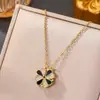Nuevo collar de trébol de cuatro hojas con diseño de amor para mujer, con un colgante de fritilaria con imán multiusos, cadena de clavícula que combina con todo.