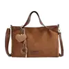 Bolsa transversal de ombro único texturizada, novo estilo para o dia a dia, bolsa tote de camurça, bolsa feminina versátil vintage 2026, grande capacidade, atacado