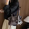 Bolso tote de lunares de nicho estilo coreano para mujer, nuevo modelo 2026, bolso de mano de gran capacidad, bolso de hombro versátil para el trabajo