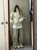 Atmósfera de principios de otoño coreana Ropa Verde Solapa Color Botón Tejido Cardigan Tejido Chaqueta Holgada para Mujer Top