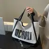 Bolsa de Lona Tote para Mujer de Gran Capacidad Nueva 2024 Bolso Portátil de Nicho Bolso de Hombro para Estudiante Universitario Bolso para Ir a Clase