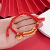 Pulseira de Fio Vermelho Tendência Nacional para o Ano do Cavalo com Moedas de Cobre, Pulseira Atratora de Riqueza e Giradora de Sorte, Acessórios para Presente de Feriado Atacado