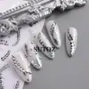2025 Pegatinas Transfronterizas para Uñas Nuevo Estilo Caliente Europeo y Americano Uñas Hueso de Serpiente Oscuras y Frescas Pegatinas de Uñas Adhesivas 3D