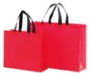 Bolsa no tejida en stock Impresión a color de película Bolso de mano para llevar ropa a domicilio Regalo publicitario Bolsa de compras promocional al por mayor