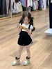 Verão 2025 Novo Estilo Coreano Roupa Infantil Moda Feminina Shorts de Alça Calça de Alça Blusa de Manga Curta