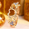 Anillo de corona hueco con forma de corazón, superventas transfronterizo para mujer, anillo de princesa de nicho de lujo ligero con circonita azul