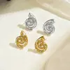 Pendientes Europeos y Americanos Transfronterizos de Oro de 18 Quilates de Alta Gama en Espiral Micro-pavimentados con Circonita Estilo Ins Elegante de Nicho Pendientes Versátiles de Moda