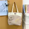 Bolso tote nuevo para estudiantes, gran capacidad, perfecto para sesiones de tutoría, diseño moderno color-blocking, patrón de dibujos animados lindo, gran capacidad, adecuado para ir al trabajo y llevar libros