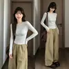 Top blanco de cuello redondo para mujer, tacto de alta gama, nuevo estilo 2026, camiseta de manga larga ajustada, conjunto estilo coreano