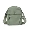 Bolsa de teléfono ligera de lona para mujer, minibolso, nuevo y versátil bolso cruzado casual de tela Oxford para mujer