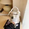 Nova Bolsa Saco Versátil de Design de Nicho Coreana 2026 Bolsa de Ombro Transversal Estilo Executivo para Mulheres