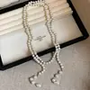 Nuevo collar de perlas artificiales de doble capa, cadena para la clavícula de moda exquisita transfronteriza, cadena de suéter de lujo ligero estilo francés