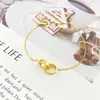 Venta Directa de Fábrica Pulsera de Doble Anillo Kajia Acero de Titanio Oro Rosa para Mujer Pulsera Sencilla de Nicho Diseño de Lujo Ligero Joyería Versátil para la Mano