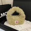 Bolsos Peludos de Felpa Lindos para Otoño e Invierno para Mujer 2025 Nuevo Bolso Cubo Peludo de Mano Bolso de Mano para Teléfono Móvil
