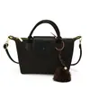 Bolso de hombro nuevo tejido simple y elegante para el día a día de otoño, bolso tipo cubo de moda, bolso cruzado para mujer estilo coreano