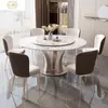 Mesa de comedor y sillas de lujo ligero con tablero de piedra brillante, juego de comedor moderno y minimalista de estilo italiano para uso doméstico, con bandeja giratoria y tablero redondo de piedra