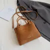 Bolso Cubo Portátil Retro de Nicho Transfronterizo para Mujer Nuevo Otoño e Invierno 2025 Bolso de Hombro Único Cruzado Bolso de Hombro Cruzado Informal de Moda para Viajar