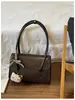 Bolsa de mano estilo retro, de alta gama, gran capacidad para mujer, nueva colección 2025, moderna y única, adecuada para ir al trabajo