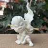 Escultura de Fruta em Imitação de Marfim Estilo Chinês de Sun Wukong, o Grande Sábio, Flutuando na Água, Decoração Criativa para Mesa de Escritório Atacado