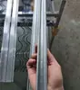Estándar Nacional Ranura para Tarjeta de Invernadero Galvanizado por Hot-Dipping Resorte de Tarjeta Ranura para Tarjeta de Aleación de Aluminio Resistente a la Corrosión Sellado de Ventana Película de Presión del Viento