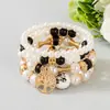Pulsera de cuentas de moda bohemia de venta caliente transfronteriza con colgante de árbol de la vida y conjunto de pulseras en capas de perlas artificiales al por mayor