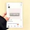 Soporte de teléfono portátil con flor pequeña morada, adecuado para Apple, Huawei, OPPO, Vivo, Xiaomi, soporte adhesivo plegable