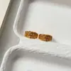 Pendientes de Hebilla Europeos y Americanos Dulces Frescos Huecos de Cruz Flor de Iris para Mujer Diseño de Nicho Versátiles Modernos Pendientes de Lujo Ligero Adornos para Orejas Mujer