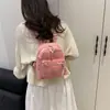 Mini mochila casual transfronteriza para mujer, nuevo estilo 2026, diseño moderno y simple, adecuada para viajes y salidas, hecha de tela de pana