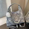 Bolso grande de mujer popular transfronterizo, moderno y de alta gama, con detalle de lazo, mochila de un solo hombro y de doble hombro, bolso de axila de diseño nicho