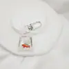 Chaveiro de peixe dourado de doce transparente explosivo criativo da Amazon Chaveiro de carpa de resina personalizado atividades pequenos presentes