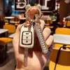 Ajuste de Imagem Aplicável Conjunto de Chaves Feminino Prancha Reta Estilo Feng Antigo Jing Rui Bin Zhi xrv Bolsa para Controle Remoto de Carro Concha com Fivela Ge Rui