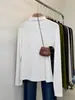 Camiseta de manga larga con cuello semi-alto, diseño nuevo 2026 para mujer, color liso, corte ajustado, top para superponer, tejido de punto base