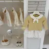 LeenbabyCreme de Queijo! Conjunto original, super fofo, de blusa para menina com laço na cor creme e calça pantalona de bolinhas