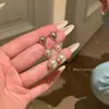 Pendientes de aguja de plata S925 con circonitas brillantes y exquisitas para mujer, ligeros, lujosos y elegantes, de alta gama, populares entre las celebridades de Internet, que combinan con todo.